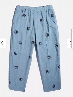 Baby blue smiley corduroy pants from Urban Outfitters